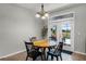 Bright breakfast nook with a round table and a view of the outdoor pool at 4631 Cypress Forest Ln, St Cloud, FL 34772