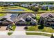 Beautiful home boasts a manicured lawn, brick driveway, and a two-car garage, adding to its curb appeal at 4631 Cypress Forest Ln, St Cloud, FL 34772