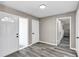 The entryway features wood-look flooring and multiple doors at 5307 Sandy Hill Dr, Orlando, FL 32821