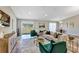 Bright and airy living room with hardwood floors, stylish furniture and lots of natural light at 5307 Sandy Hill Dr, Orlando, FL 32821