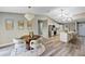 Bright living space with open floor plan, connecting the dining area and kitchen at 5307 Sandy Hill Dr, Orlando, FL 32821