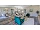 Open living space with modern furnishings, including dining area and living room at 5307 Sandy Hill Dr, Orlando, FL 32821