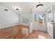 Inviting entryway featuring tiled accents and wood-look flooring at 5414 Zinnia St, Leesburg, FL 34748