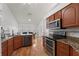 Bright kitchen area offering eat-in area and stainless steel dishwasher at 5414 Zinnia St, Leesburg, FL 34748
