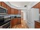 Modern kitchen features stainless steel appliances and ample cabinet space at 5414 Zinnia St, Leesburg, FL 34748