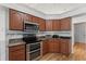 Updated kitchen with stainless steel appliances and granite countertops at 5414 Zinnia St, Leesburg, FL 34748