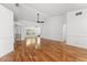 Spacious living room features vaulted ceilings and wood-look flooring at 5414 Zinnia St, Leesburg, FL 34748