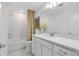 Bathroom with a shower/tub combo, quartz countertops, and neutral decor at 6033 Tree Crossing Ln, St Cloud, FL 34771