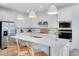 Bright kitchen featuring pendant lighting, stainless steel appliances, and a large island at 6033 Tree Crossing Ln, St Cloud, FL 34771