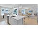 Open-concept kitchen and living room providing ample space for entertaining and everyday living at 6033 Tree Crossing Ln, St Cloud, FL 34771