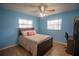 Charming bedroom with wood laminate flooring and ample natural light at 613 Andrew St, Altamonte Springs, FL 32714