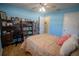 View of the bedroom with wood floors and lots of book storage space at 613 Andrew St, Altamonte Springs, FL 32714