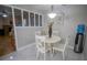 This dining area features unique decorations on the walls and half-wall at 613 Andrew St, Altamonte Springs, FL 32714