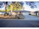 Charming single Gathering home featuring a well-maintained lawn, mature trees, and an attached two car garage at 613 Andrew St, Altamonte Springs, FL 32714
