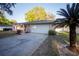 Spacious home with an attached garage and neatly landscaped yard, offering ample parking and curb appeal at 613 Andrew St, Altamonte Springs, FL 32714