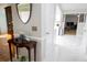 Inviting foyer with elegant marble flooring and views into the living spaces at 613 Andrew St, Altamonte Springs, FL 32714