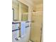 Cozy bathroom featuring tiled walls, shower, and decorative blue-and-white accents at 714 West Ct, Longwood, FL 32750