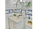 Nicely appointed bathroom boasting a decorative mirror, updated vanity and charming decor at 714 West Ct, Longwood, FL 32750