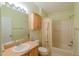 Bathroom featuring a vanity with sink and a shower-tub combo at 790 Blake Ln, The Villages, FL 32162