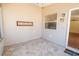 Bright Florida room features neutral tile flooring and light-colored walls at 790 Blake Ln, The Villages, FL 32162