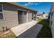 Sliding glass doors open to the back patio, an ideal space for outdoor entertaining and relaxation at 8201 Se 169Th Palownia Loop, The Villages, FL 32162