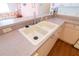 Close-up of a clean, double-basin kitchen sink with ample counter space and stylish faucet at 8201 Se 169Th Palownia Loop, The Villages, FL 32162