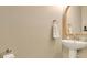 Pedestal sink with nice fixtures and a lovely mirror at 8549 Lovett Ave, Orlando, FL 32832