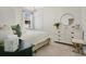 Serene bedroom with soft carpet, neutral tones, and ample natural light at 8549 Lovett Ave, Orlando, FL 32832
