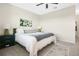 Comfortable bedroom with plush carpeting and a king-sized bed with stylish decor at 8549 Lovett Ave, Orlando, FL 32832