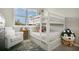 Charming bedroom features a bunk bed and lots of natural light at 8549 Lovett Ave, Orlando, FL 32832