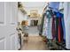 Spacious walk-in closet with ample storage and organizational features at 8549 Lovett Ave, Orlando, FL 32832