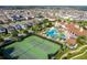 Aerial view of community amenities including pool, tennis courts, and clubhouse, enhancing lifestyle at 9513 Amber Chestnut Way, Winter Garden, FL 34787