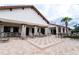 Open-air clubhouse patio with ample seating and lounge area, ideal for gatherings at 9513 Amber Chestnut Way, Winter Garden, FL 34787