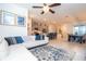 Spacious living area flows into the modern kitchen and features a dining area with natural light at 9513 Amber Chestnut Way, Winter Garden, FL 34787