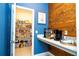 Walk-in pantry with white countertops and coffee bar at 9513 Amber Chestnut Way, Winter Garden, FL 34787