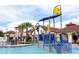 Waterpark at the pool area featuring a splash zone with playful water features for Gathering fun at 9513 Amber Chestnut Way, Winter Garden, FL 34787