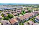 Aerial view of neighborhood homes with their terra cotta roofs and screened-in pools at 1019 Tuscan Hills Blvd, Davenport, FL 33897