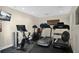 This exercise room is fully equipped with treadmill, exercise bike, and a television for entertainment at 1100 Delaney Ave # E13, Orlando, FL 32806