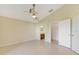 Spacious main bedroom featuring an ensuite bathroom and closet at 1110 Stoneham Dr, Groveland, FL 34736