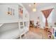 Playful bedroom with a unique bunk bed, cozy decor, and warm natural lighting at 14815 Tullamore Loop, Winter Garden, FL 34787