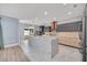 Modern kitchen featuring marble island, stainless steel appliances, and stylish cabinetry at 14815 Tullamore Loop, Winter Garden, FL 34787