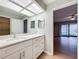 Bright bathroom vanity featuring updated hardware and a modern mirror at 2471 Tahoe Cir # 00, Winter Park, FL 32792