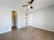 Bedroom featuring new floors and a walk-in closet at 2471 Tahoe Cir # 00, Winter Park, FL 32792