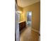Bathroom featuring a vanity with storage and a view into the tiled bath and shower area at 2749 Sand Oak Loop, Apopka, FL 32712