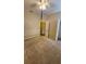 Light-filled bedroom with carpet, closet, and neutral walls, provides a calm and inviting atmosphere at 2749 Sand Oak Loop, Apopka, FL 32712