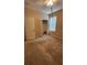 Neutral bedroom with natural light, closet, and carpet, waiting for your personal touches and decor at 2749 Sand Oak Loop, Apopka, FL 32712