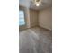 Standard bedroom featuring neutral walls, carpet, and ceiling fan, ready for personalization at 2749 Sand Oak Loop, Apopka, FL 32712