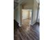 Entryway with wood-look tile flooring offering an inviting transition to the rest of the home at 2749 Sand Oak Loop, Apopka, FL 32712