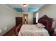 Bedroom with hardwood flooring, decorative ceilings and an ensuite bathroom and closet at 2749 Sand Oak Loop, Apopka, FL 32712