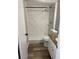 Newly renovated bathroom featuring a white-tiled shower with new fixtures and vanity at 395 Wymore Rd # 200, Altamonte Springs, FL 32714